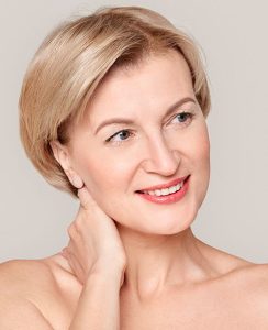 Youngish face of a mature woman after non-surgical facelift treatment